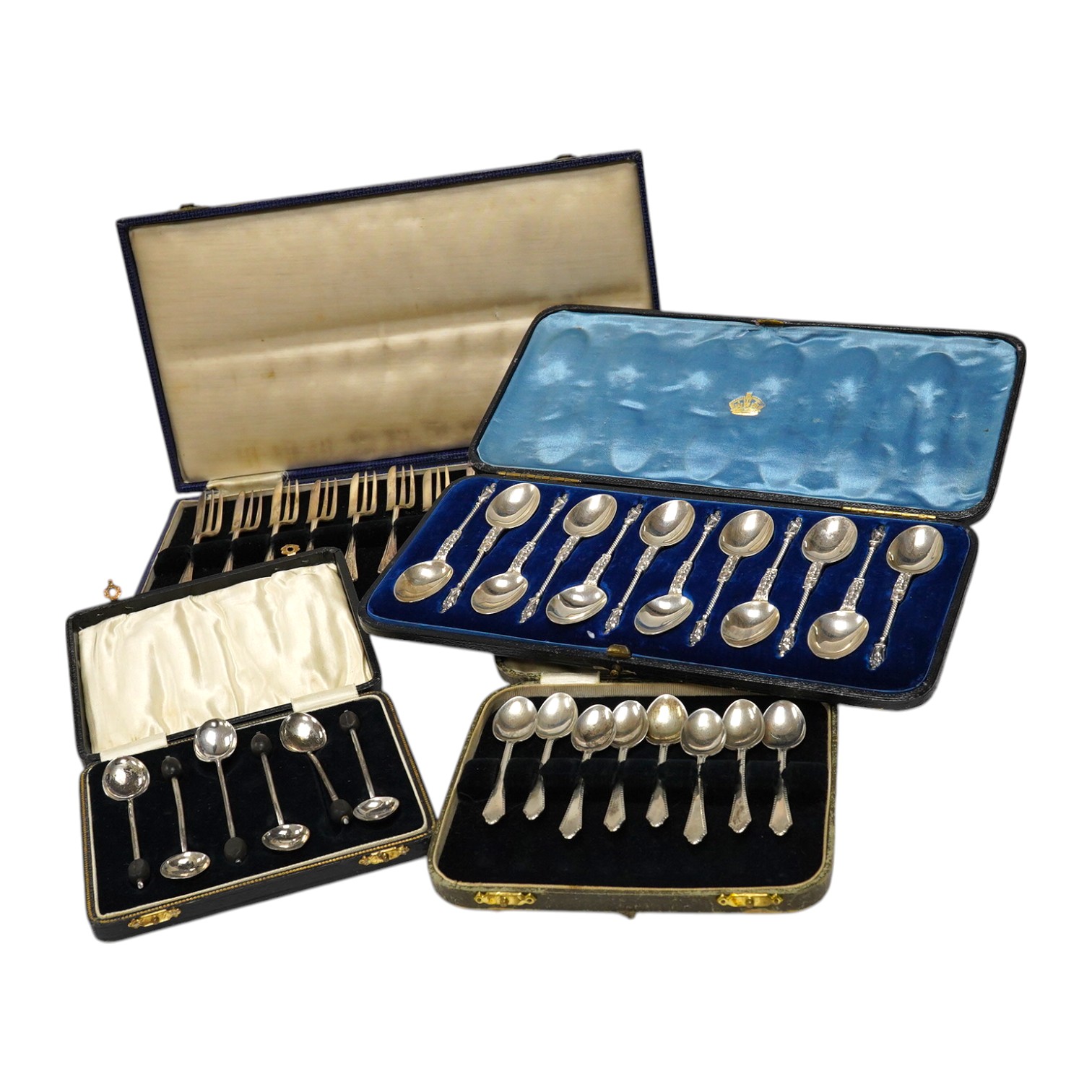 A cased set of twelve late Victorian silver coffee spoons, by Goldsmiths & Silversmiths Co Ltd, London, 1890 and three other later cased silver sets including six bean end coffee spoons, eight coffee spoons and twelve pa